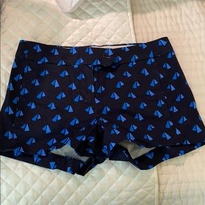 J. Crew navy shorts with lighter blue sail boats